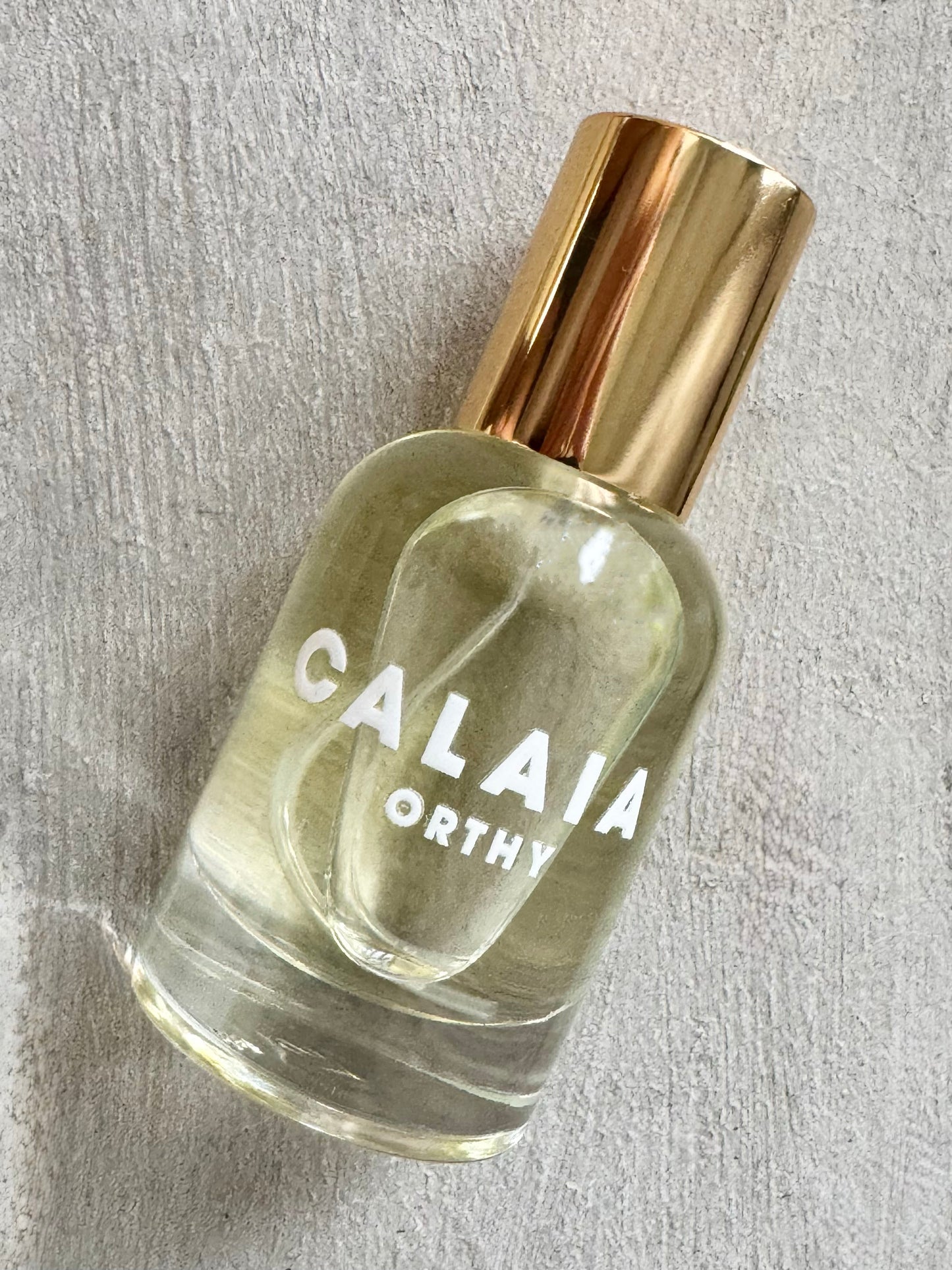 Calaia Eau De Parfum Travel Spray - Orthy (10 ML)